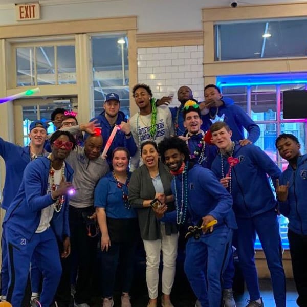 A group celebrating together at Pepperoni Cafe