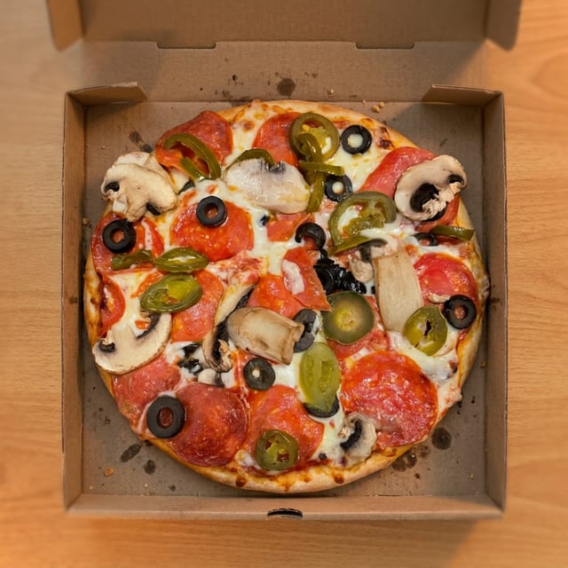 4 Toppings Pizza.